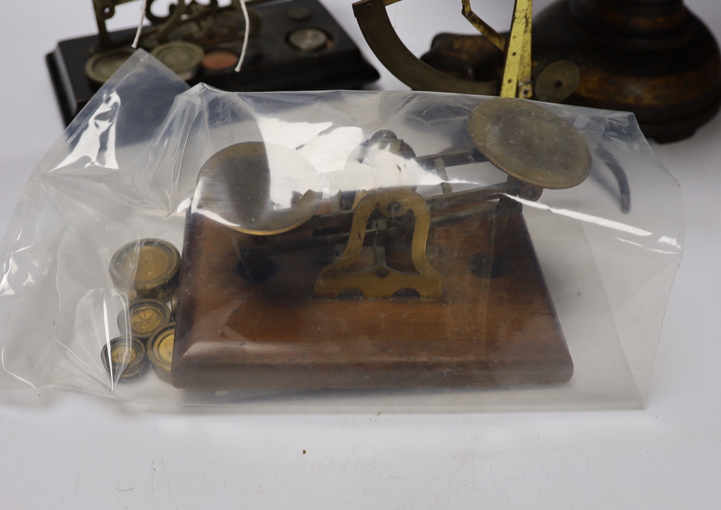 Five various postal scales, largest 55cm wide